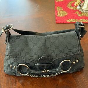 Authentic Gucci black GG monogram canvas shoulder bag